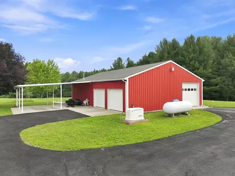 Exterior - 8099 Greenwood Rd, Gladwin, MI 48624 photo 2 of 18