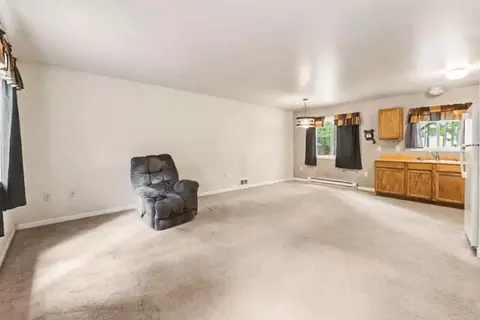 Living - 207 Dover Dr, Roscommon, MI 48653 photo 2 of 3