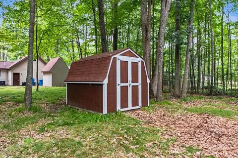 Exterior - 207 Dover Dr, Roscommon, MI 48653 photo 1 of 5
