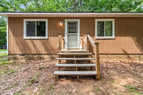 Exterior - 207 Dover Dr, Roscommon, MI 48653 photo 3 of 5