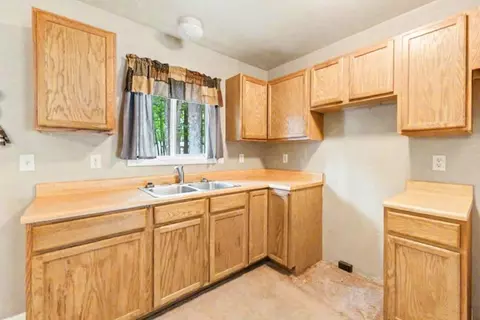 Kitchen - 207 Dover Dr, Roscommon, MI 48653 photo 3 of 3