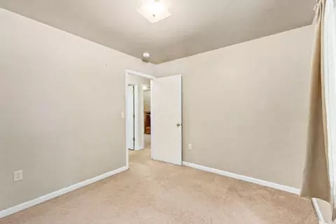 Bedroom - 207 Dover Dr, Roscommon, MI 48653 photo 4 of 5