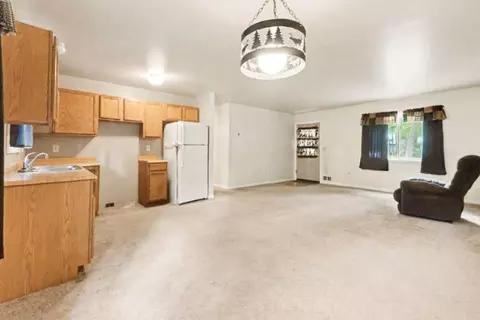 Living - 207 Dover Dr, Roscommon, MI 48653 photo 1 of 3