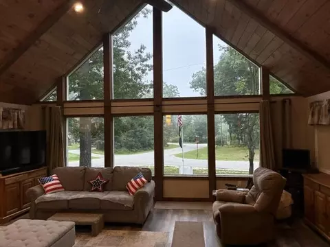 Living - 301 Pebble Ave, Roscommon, MI 48653 photo 1 of 2