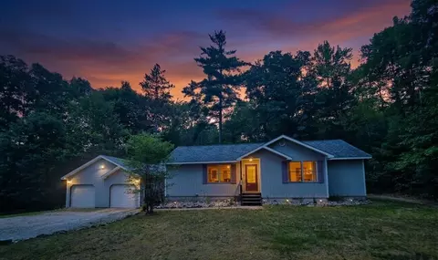 Exterior - 9535 E Sunset Dr, Roscommon, MI 48653 photo 2 of 14