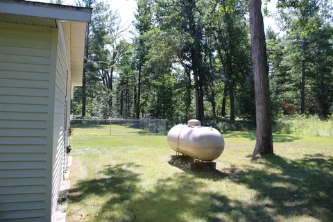 Exterior - 4701 Frank Dr, Comins, MI 48619 photo 5 of 12
