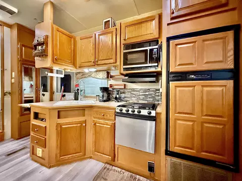 Kitchen - 4446 Shooks Rd, Wolverine, MI 49799 photo 7 of 8