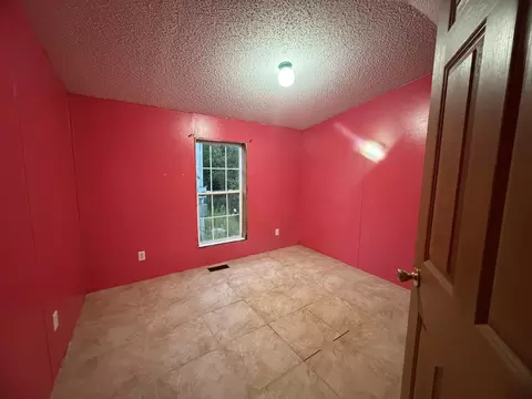 Bedroom - 2601 E Swede Rd, Spruce, MI 48762 photo 2 of 3