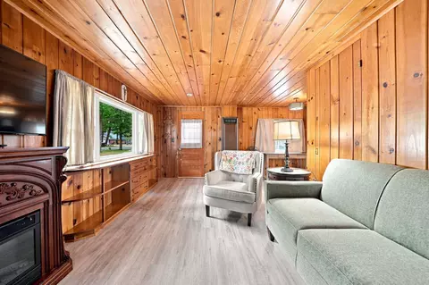 Living - 115 Swanson Ave, Roscommon, MI 48653 photo 4 of 5