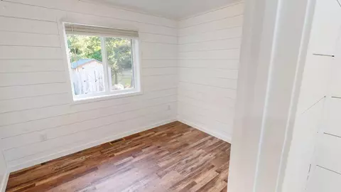 Bedroom - 447 S 449 S Main St, Roscommon, MI 48653 photo 2 of 3