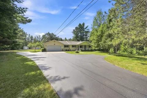 Exterior - 312 Division St, Roscommon, MI 48653 photo 6 of 13