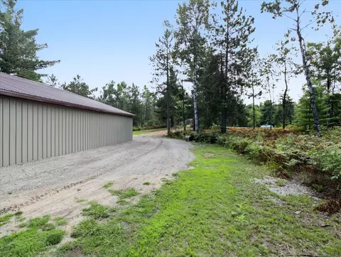 Exterior - 6691 Boone Ln, Vanderbilt, MI 49795 photo 10 of 12