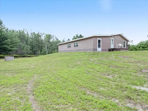 Exterior - 6691 Boone Ln, Vanderbilt, MI 49795 photo 3 of 12