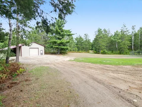 Exterior - 6691 Boone Ln, Vanderbilt, MI 49795 photo 6 of 12