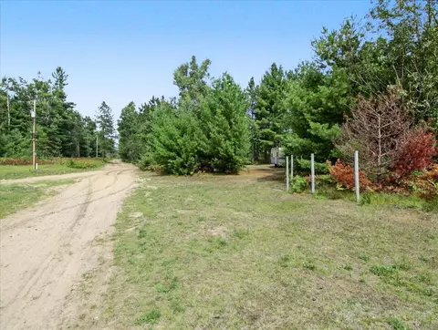 Exterior - 6691 Boone Ln, Vanderbilt, MI 49795 photo 5 of 12