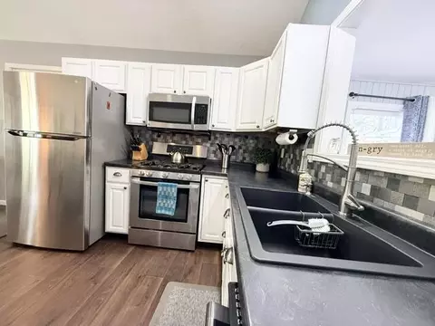 Kitchen - 3175 W Maplehurst Dr, Roscommon, MI 48653 photo 5 of 6