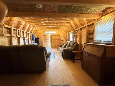 Living - 3175 W Maplehurst Dr, Roscommon, MI 48653 photo 8 of 9