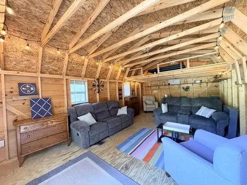 Living - 3175 W Maplehurst Dr, Roscommon, MI 48653 photo 4 of 9