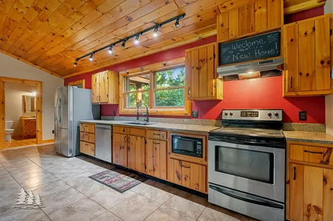 Kitchen - 19609 Mcintire Rd, Comins, MI 48619 photo 1 of 3