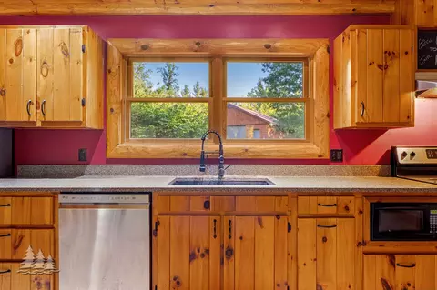 Kitchen - 19609 Mcintire Rd, Comins, MI 48619 photo 3 of 3