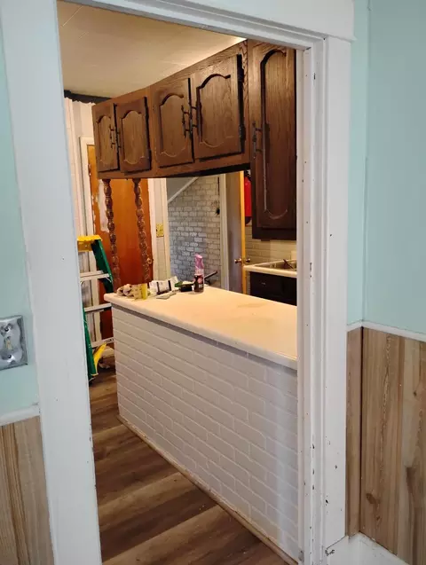 Kitchen - 639 Duncan Ave, Cheboygan, MI 49721 photo 2 of 2