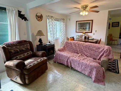 Living - 10948 Beaver Pond Dr, Frederic, MI 49733 photo 3 of 3