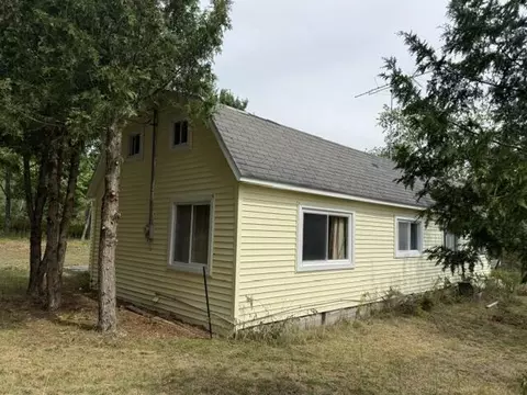 Exterior - 10948 Beaver Pond Dr, Frederic, MI 49733 photo 3 of 6