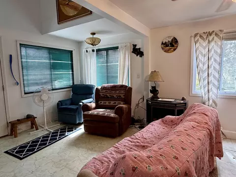 Living - 10948 Beaver Pond Dr, Frederic, MI 49733 photo 2 of 3