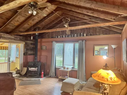 Living - 1252 Deeter Rd, Luzerne, MI 48636 photo 4 of 5