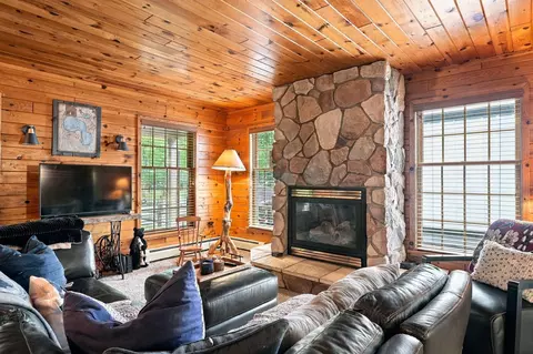Living - 215 Cardinal Ave, Roscommon, MI 48653 photo 1 of 4