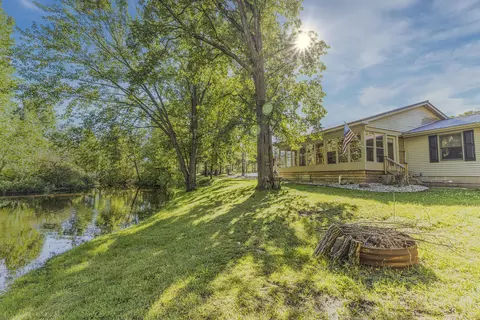 89 River Dr, Merritt, MI 49667