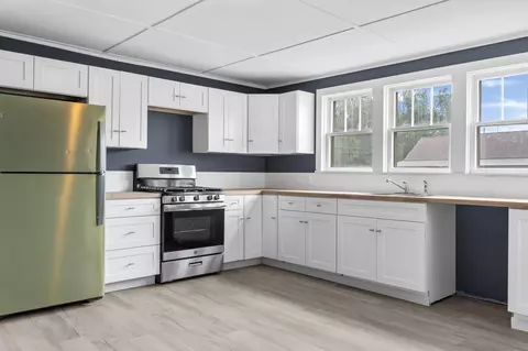Kitchen - 135 S D St, Cheboygan, MI 49721 photo 1 of 2