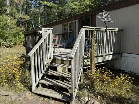 Exterior - 7275 Camp Rd, Ocqueoc, MI 49759 photo 1 of 7