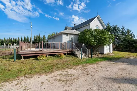 Exterior - 10522 Rotter Rd, Alanson, MI 49706 photo 2 of 24