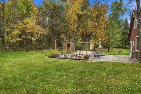 Exterior - 308 Winchester Dr, Roscommon, MI 48653 photo 5 of 7