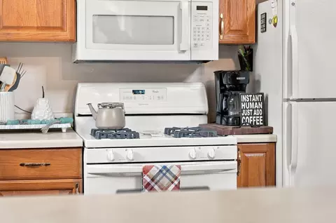 Kitchen - 308 Winchester Dr, Roscommon, MI 48653 photo 4 of 5