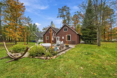 Exterior - 308 Winchester Dr, Roscommon, MI 48653 photo 4 of 7