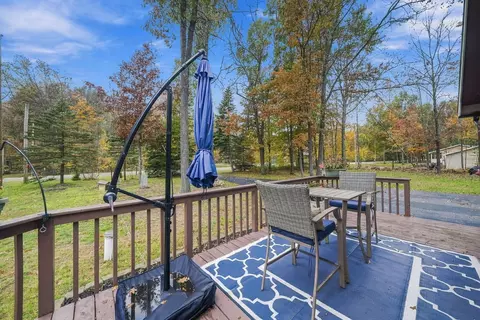 Exterior - 308 Winchester Dr, Roscommon, MI 48653 photo 6 of 7