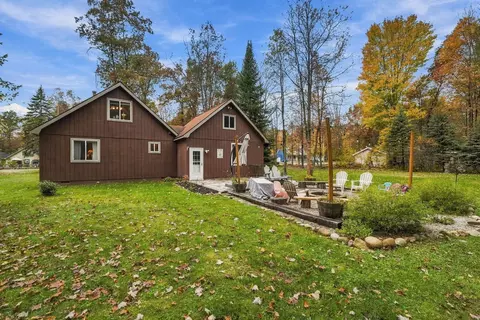 Exterior - 308 Winchester Dr, Roscommon, MI 48653 photo 3 of 7