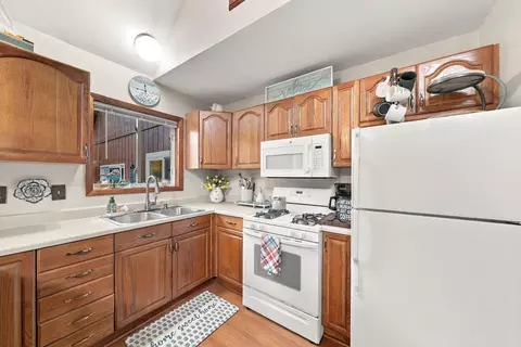 Kitchen - 308 Winchester Dr, Roscommon, MI 48653 photo 2 of 5
