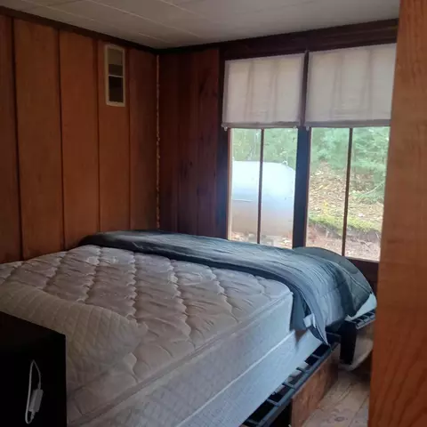 Bedroom - 295 East Lane Rd, Luzerne, MI 48636 photo 1 of 1