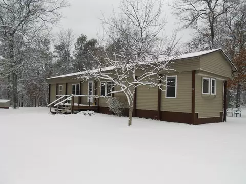 3704 S Stephan Bridge Rd, Grayling, MI 49738 photo 1