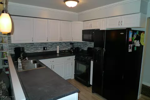 4106 Windward Dr, Lansing, MI 48911 photo 8