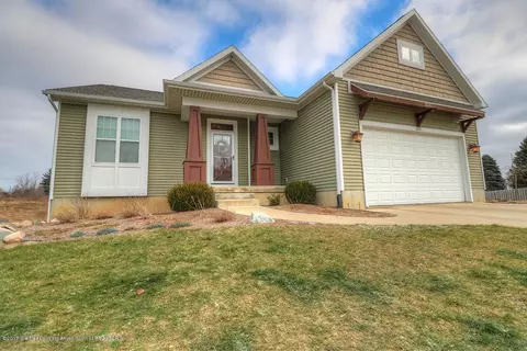 1079 Oakwood Dr, Dewitt, MI 48820 photo 1