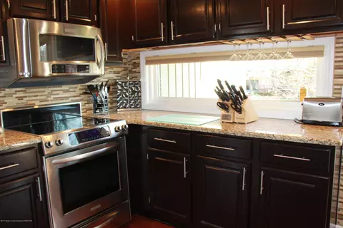 1124 Woodwind Trl, Haslett, MI 48840 photo 16