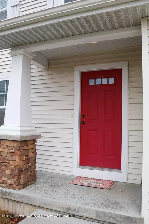 1043 Oakwood Dr, Dewitt, MI 48820 photo 2