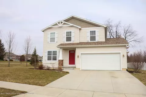 1043 Oakwood Dr, Dewitt, MI 48820 photo 1