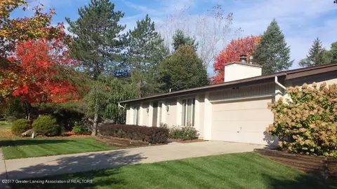 1140 Woodside Dr, Haslett, MI 48840 photo 1