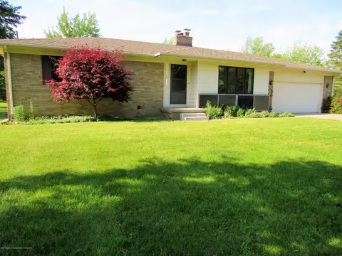8834 W Howe Rd, Eagle, MI 48822 photo 1