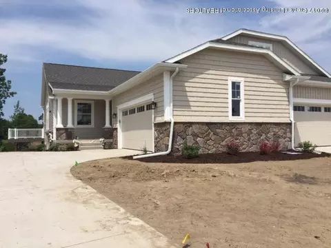 5222 E Hawk Hollow Dr, Bath, MI 48808 photo 1